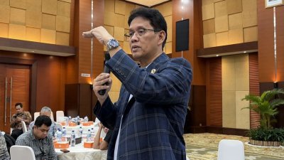 Sentralisasi Kebijakan Picu Fitch Ratings Pangkas Outlook Utang Indonesia